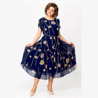 Iris | Marine Polkadot Jurk